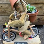 Bycicle flower pot person